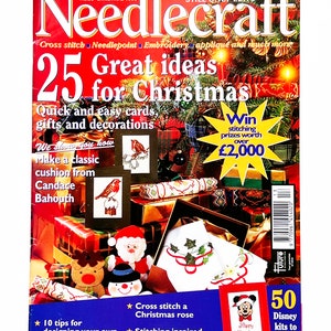 May include: A magazine cover for Needlecraft magazine, issue number 55, Christmas 1995. The cover features a festive Christmas theme with a red and white snowman, a red and white Santa Claus, and a red robin bird. The cover text reads "25 Great Ideas for Christmas" and "Win stitching prizes worth over £2,000".