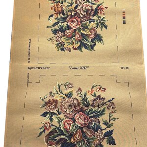 May include: Two rectangular fabric panels with floral designs. Each panel features a bouquet of pink, peach, and brown flowers with green leaves. The fabric is tan with the text "Louis XIII" and "Royal Paris".