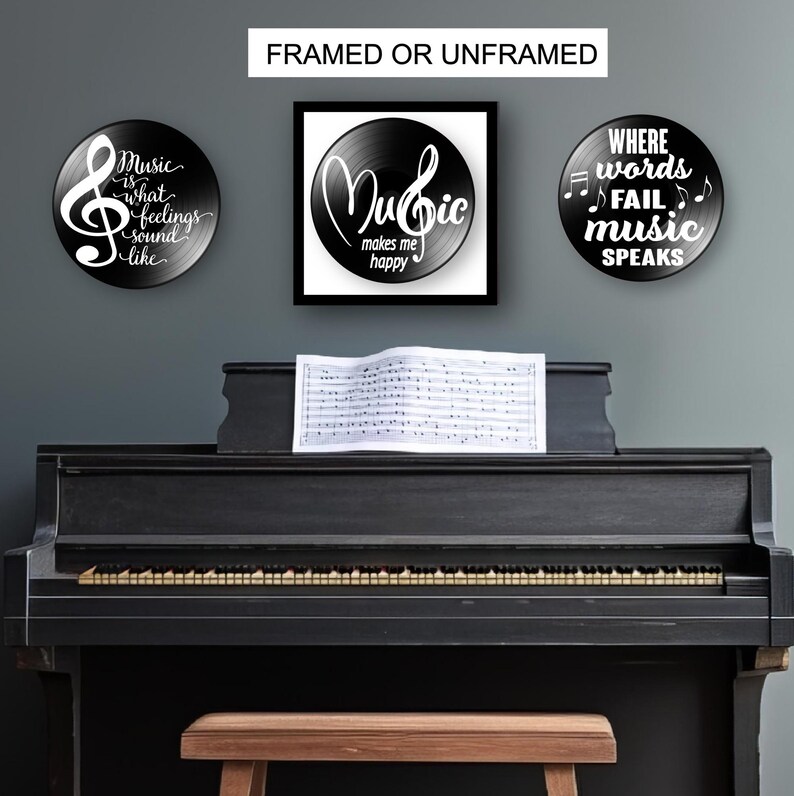 May include: A black piano with sheet music on the stand, and three framed or unframed wall art pieces. The art pieces are black with white text and musical notes. The text on the art pieces reads: "Music is what feelings sound like", "Music makes me happy", and "Where words fail music speaks".
