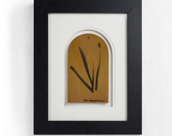 Framed Clay Tablet with beautiful depth and design. Calligraphy brush strokes on a round-topped ceramic panel.