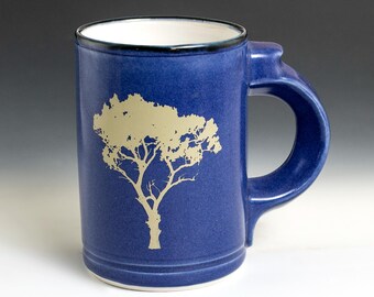 Blue Mugs with trees graphics