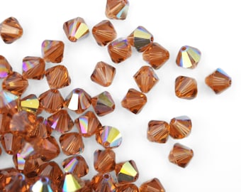 6mm Light Smoked Topaz AB Bicone 5328 Crystals by Swarovski® Beads