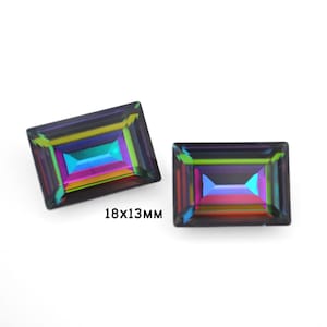 May include: Two iridescent rectangular gemstones, each measuring 18x13mm. The gemstones have a rainbow effect with shades of purple, green, blue, and yellow.