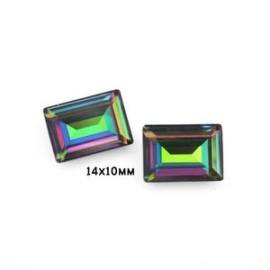 May include: Two iridescent rectangular glass gems, each measuring 14mm by 10mm. The gems have a rainbow effect with shades of green, blue, and purple.