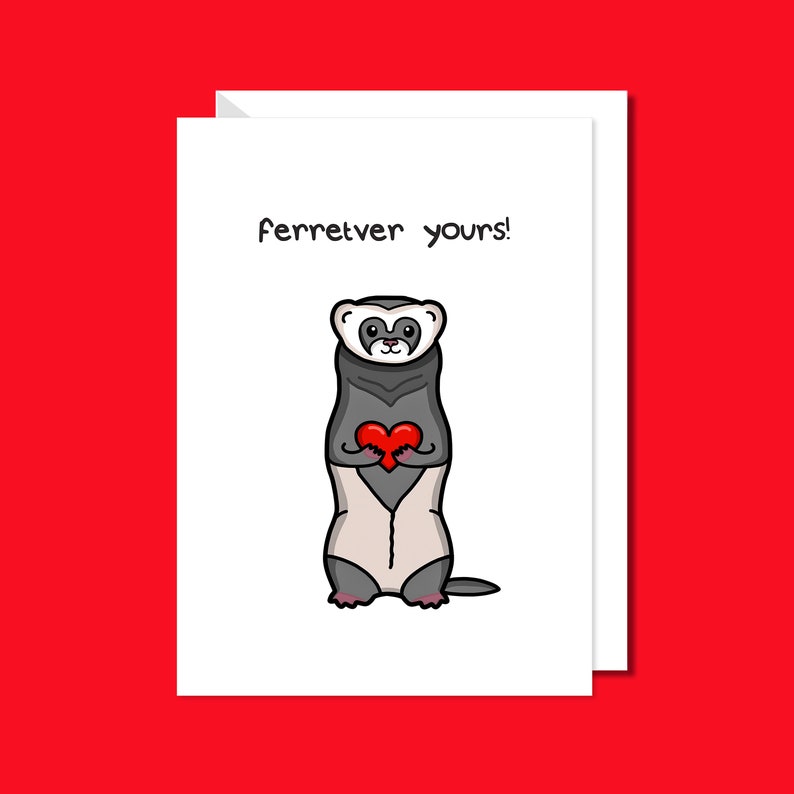 The Ferretver Yours Valentines Day Love Card on a red background. A white a6 greetings card with a drawing of a happy ferret holding a red heart saying ferreter yours on the front.