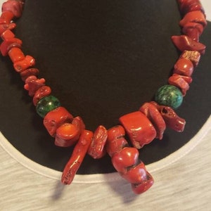 Red coral, in the turquoise family, but deep beautiful vibrant RED Christmas green agate marble Accents that is beaded sterling