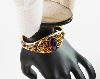 Pulseira articulada vintage em filigrana banhada a ouro com ametista facetada.