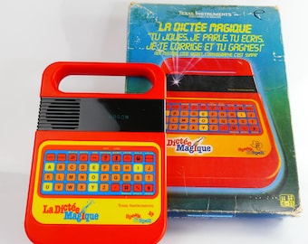 Brinquedo vintage Texas Instruments "La Dictée Magique" Edição Francesa Speak & Spell do filme E.T. - O Extraterrestre (1982) FUNCIONA PERFEITAMENTE Na caixa