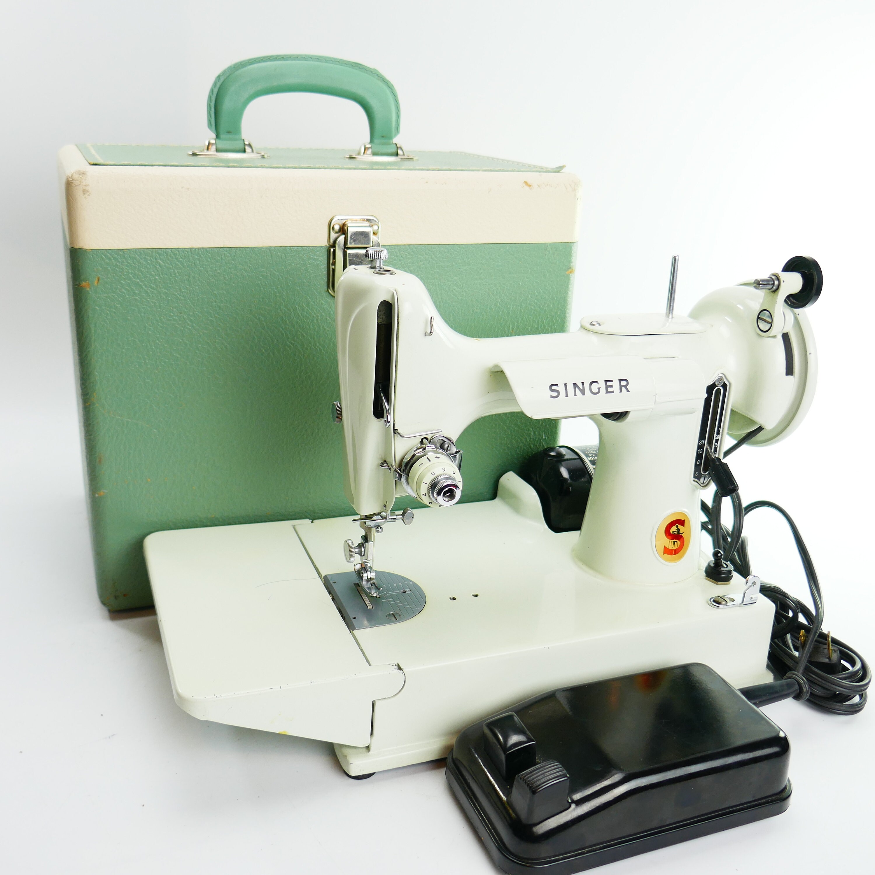 Singer featherweight sewing machine carrying cases made from PNW red cedar  with lazer cut of a featherweight sewing machine.