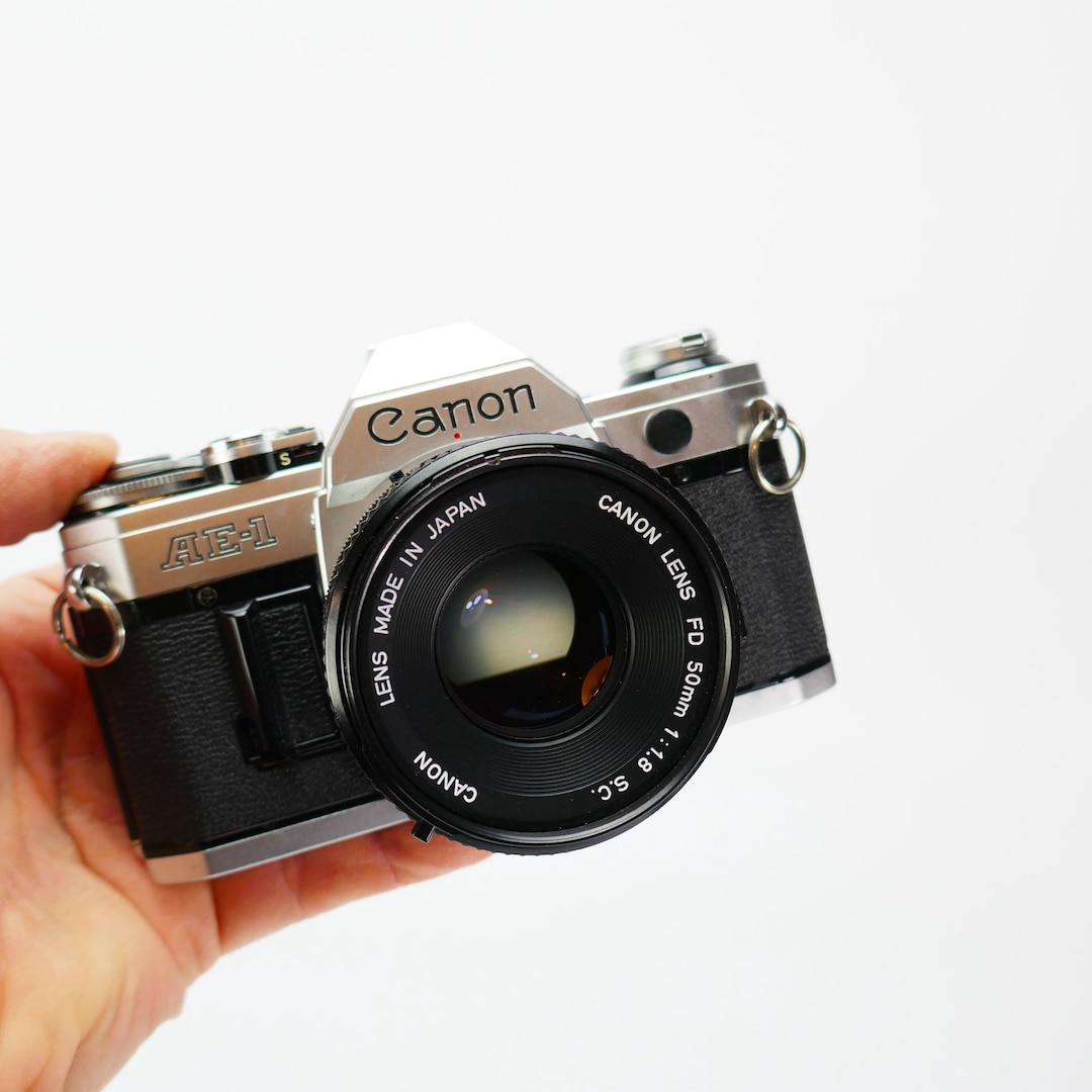 ヴィンテージ Canon AE-1 Canon FD 50 mm 1:1.8 レンズ 35 mm 日本製