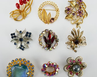 Lote vintage de 9 broches de bisutería X1447