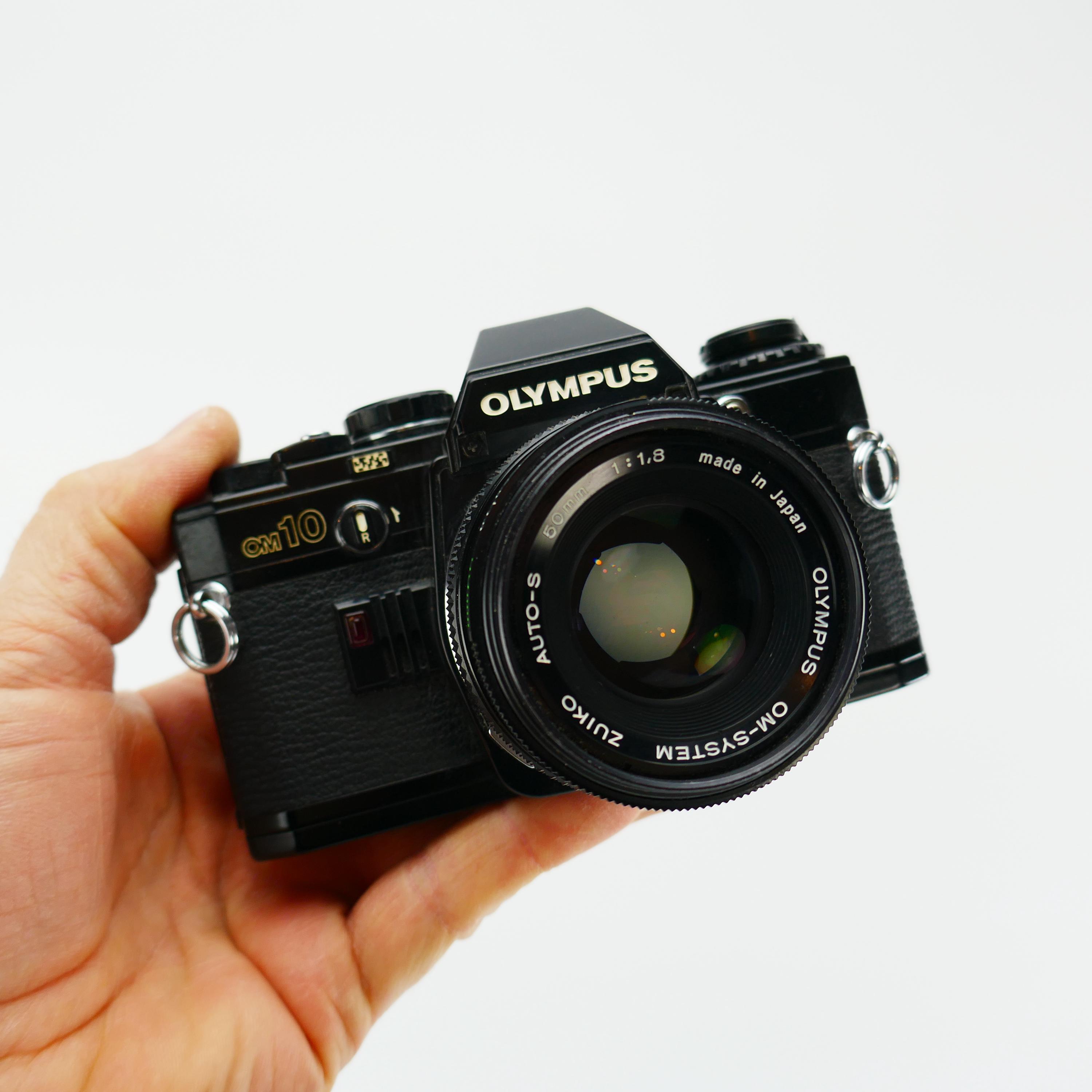 Olympus Om -10 Manual Camera In Chrome Or Black + Optional 50mm F