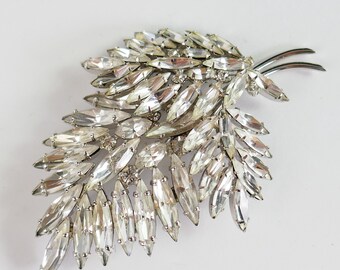 Broche vintage assinado SHERMAN em formato de folha transparente com cristais Swarovski, bijuteria Gustave.
