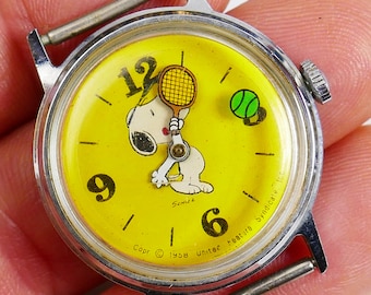À réviser. Rare balle mystère de tennis Timex Peanuts Snoopy jaune vintage de 1959.