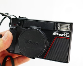 Vintage Nikon L35af 35mm Japan Film Camera working