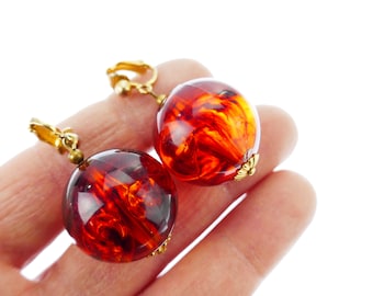 Vintage plastic dangling amber color balls clip on gold tone