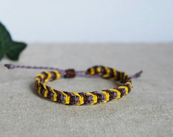Wax cord Friendship Bracelet in purple and yellow, unisex Surf Bracelet, waterproof jewelry, gift for traveller or friend by Reek Knot co