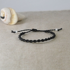 Tiny Black Bracelet knotted by macrame, Stackable cord jewelry, water resistant wax bracelet, gift for friends or coworkers by Reef Knot co