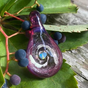 Cremation glass memorial ash pendant with opal gemstone core , silver fume and glow in the dark powder behind the ashes