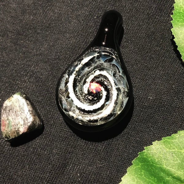 Cremation glass memorial ash pendant with opal gemstone core , silver fume and glow in the dark powder behind the ashes