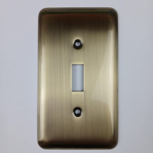 May include: A brushed brass single-gang light switch cover plate.