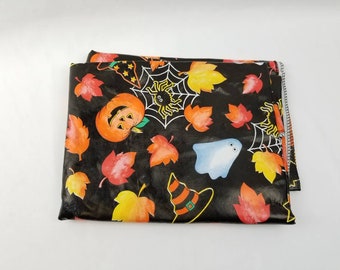 Vintage Halloween Vinyl Tablecloth Felt Backing 51 x 68 Oval Retro Ghost Pumpkin Spiders