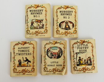 May include: Six miniature books with colorful covers and illustrations. The titles are "Nursery Rhymes No. 1", "Nursery Rhymes No. 2", "Alphabet Tongue Twisters", "Little Riddle Book", and "Little Poetry Book".