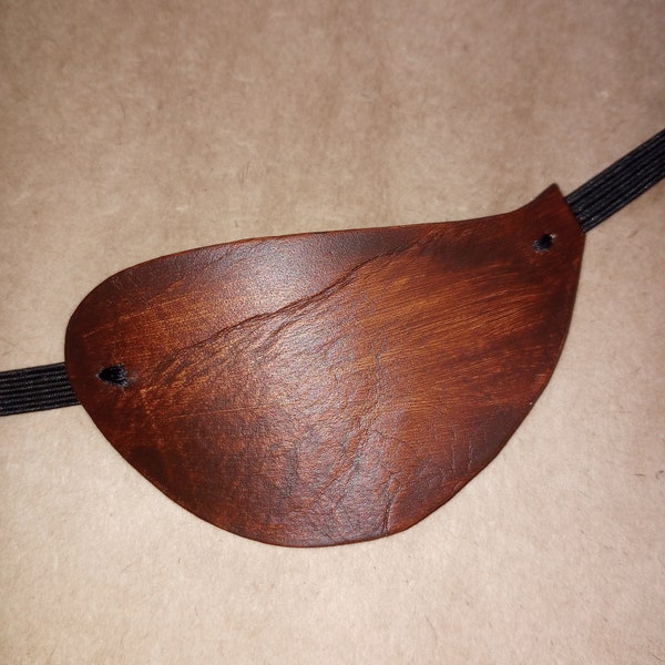 Plain, slim flat rustic brown or black leather eyepatch