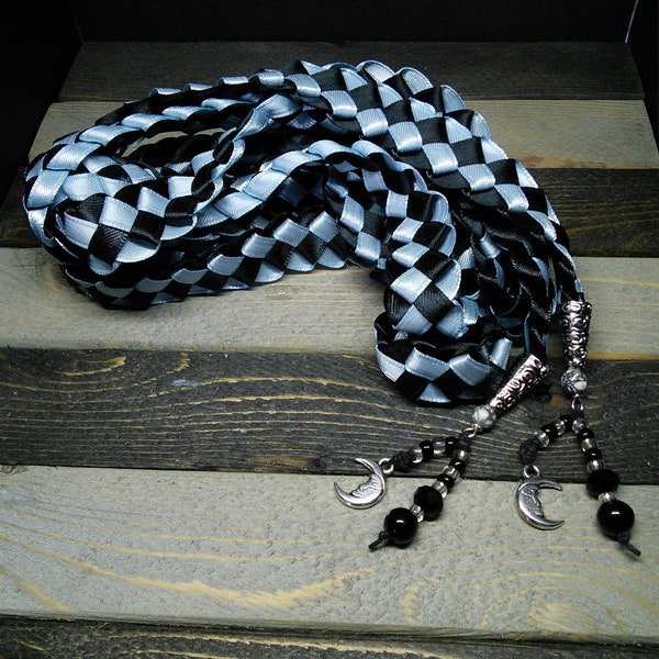 Ice blue and tuxedo black satin handfasting ribbon capped with charms and natural stone