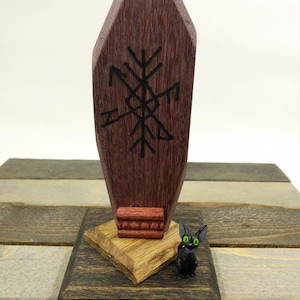 Traveler&#39;s protection shrine with a cute little black cat