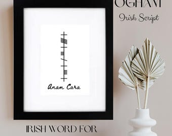 May include: A framed print with black border, displaying Ogham Irish script and the words "Anam Cara." The print also includes the text "Irish Word for Soul Friend." The artwork is on a white background.