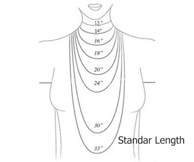 May include: A line drawing of a woman's neck and shoulders with different necklace lengths marked in inches. The lengths are 13", 14", 16", 18", 20", 24", 30", and 33". The text "Standar Length" is written below the drawing.