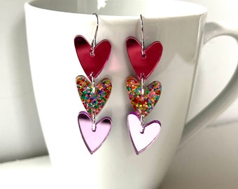 Pink Purple Sparkle Heart Dangle Earrings Confetti Resin Cascading Mirror Hearts Multi color Glitter Statement Jewelry Modern Valentine