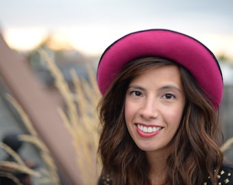 Pink studded bowler hat