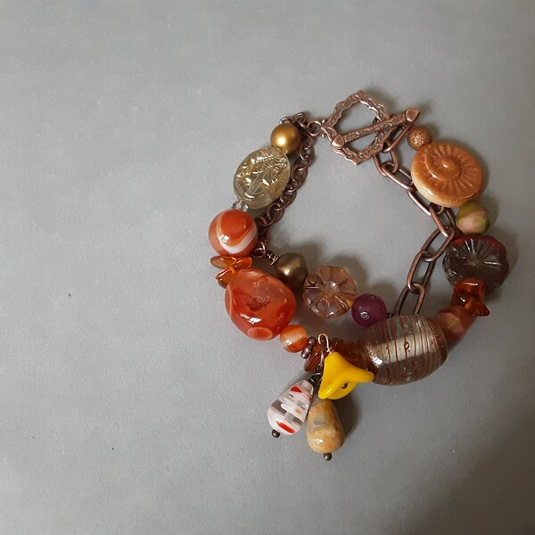 Chunky Asymmetrical Boho Bracelet with Carnelian Nuggets Lampworked Bead Czech Glass and Copper Chain with Assorted Charms