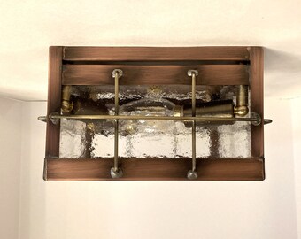 Small "Slim Peterson" ceiling fixture.With bar.Seedy glass.Antique copper. Handmade USA.LED