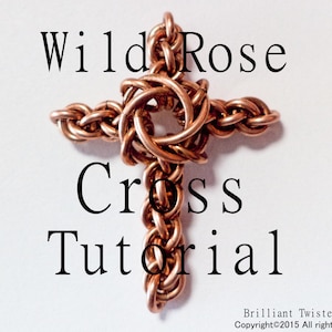 May include: A copper-coloured wire cross with a woven design. The cross is on a white background with the text "Wild Rose Cross Tutorial" and "Brilliant Twisted Skulls Copyright©2015 All rights reserved".