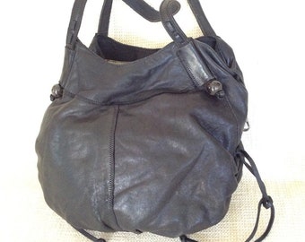 Genuine vintage LUCKY black leather shoulder bag with tassels