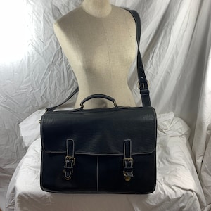 Porte-documents vintage ROOTS Canada en cuir noir