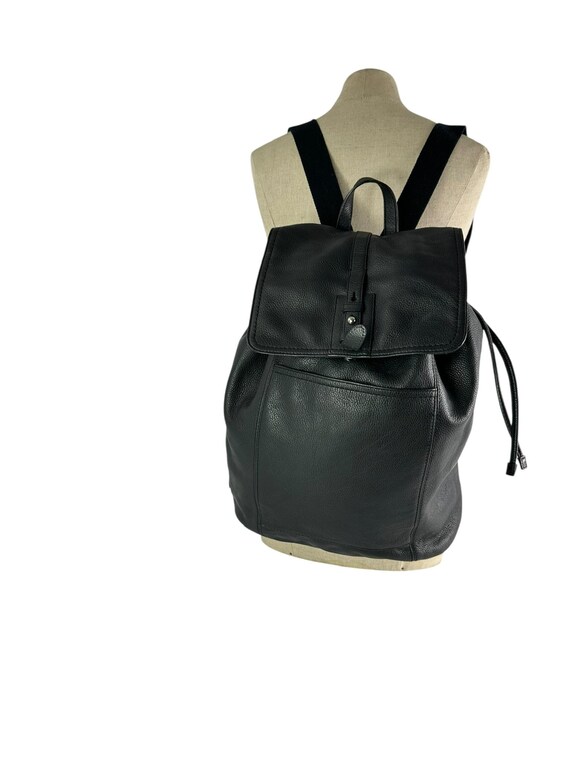 cole haan men's leather flap backpack Smart interior organization and a front zip section streamline storage Cole Haan Leather Backpack -