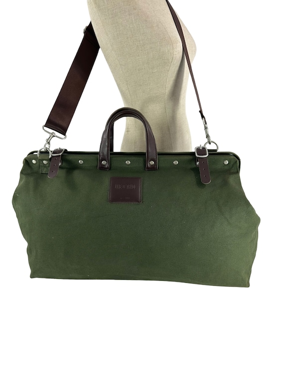 Genuine green canvas and leather trim duffle trave