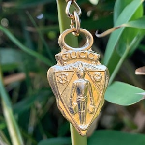 Genuine vintage GUCCI knight crest gold tone pull tab charm Etsy
