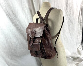 Vintage brown leather multi pocket backpack rucksack