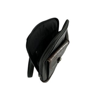 May include: Black leather clutch with a brown crocodile-textured pocket. The clutch is open, revealing a black interior. A silver-toned clasp secures the pocket. The zipper is black.