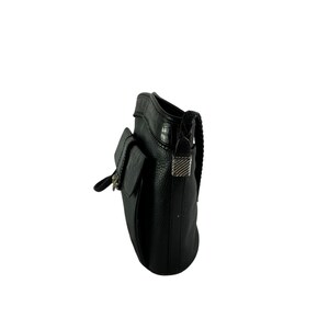 May include: Black leather crossbody bag with a flap closure and a braided strap. The bag features a textured surface and silver-tone hardware on the flap and strap attachments. The bag has a small pocket on the front.