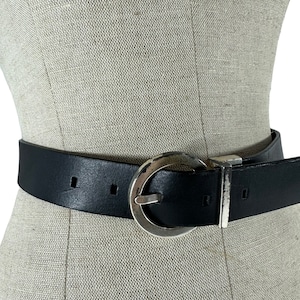 Vintage genuine Calvin Klein black brown leather belt medium unisex reversible