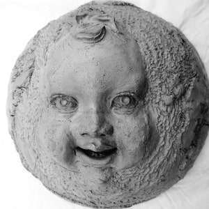 WORLD BABY, a Handmade Wall Sculpture for Indoor or Outdoor Home Decor, by Claybraven
