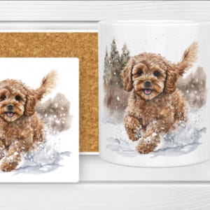 May include: A white ceramic mug and a square cork-backed coaster, both featuring a watercolor illustration of a fluffy brown puppy running through snow with a forest background. The puppy has curly fur, dark eyes, and a happy expression.