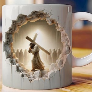 May include: White ceramic mug with a 3D design of Jesus carrying a cross through a broken wall. The design appears to be a scene from the Bible.