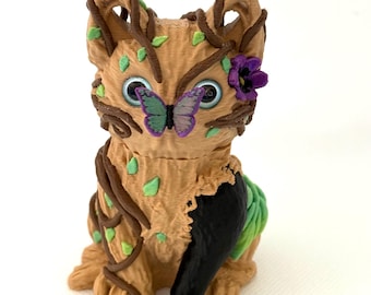Forest Cat 3D printed Figure. Green leaves and brown vines with butterfly and flower.